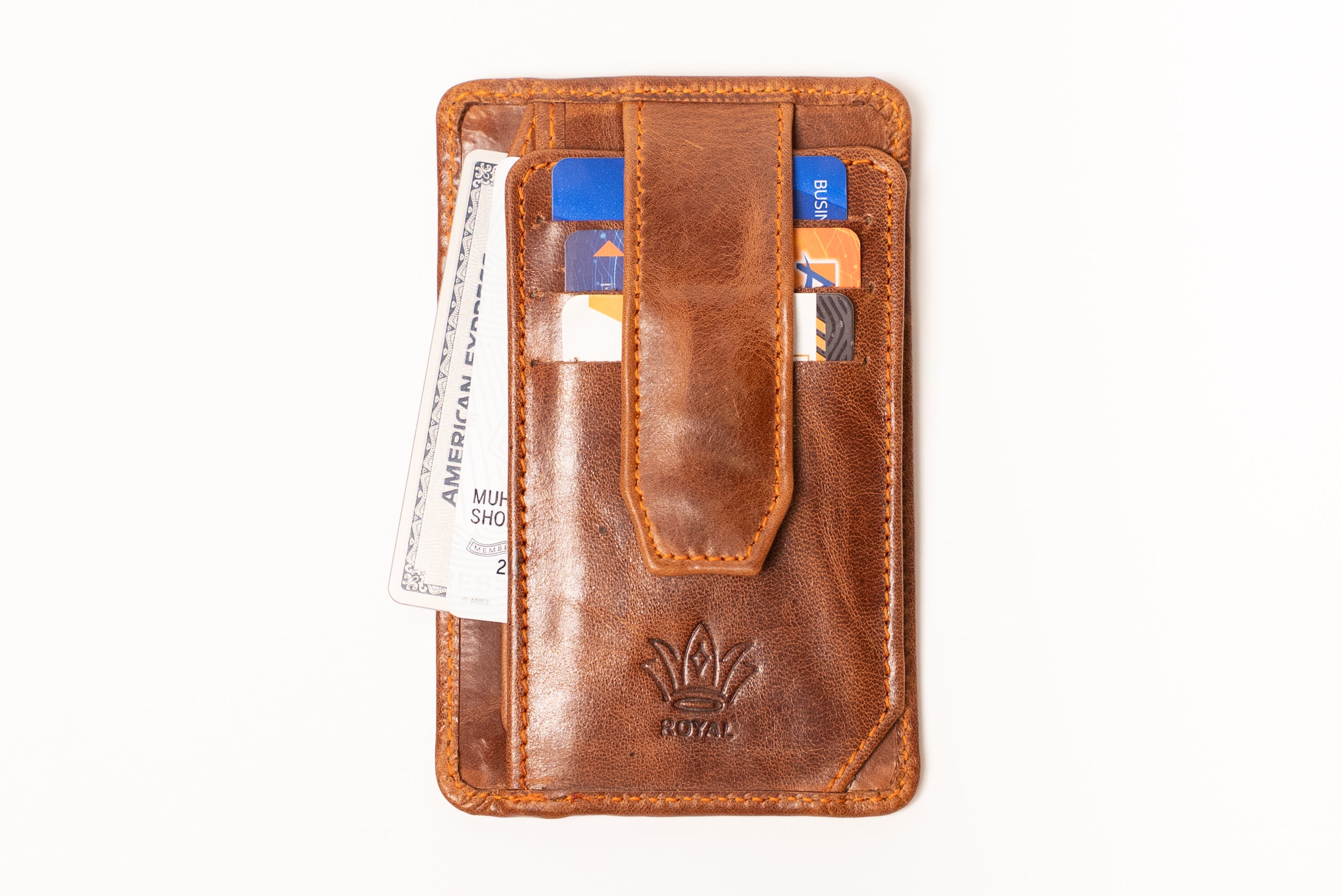 Brown leather wallet with card slots on a white background