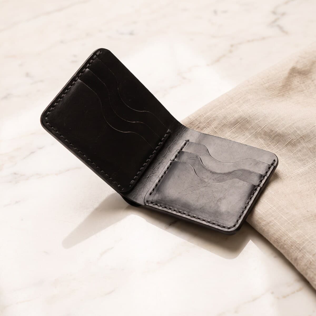 ROYAL Hand Made Regular 3 Pocket Wallet — Black — lifestyle view