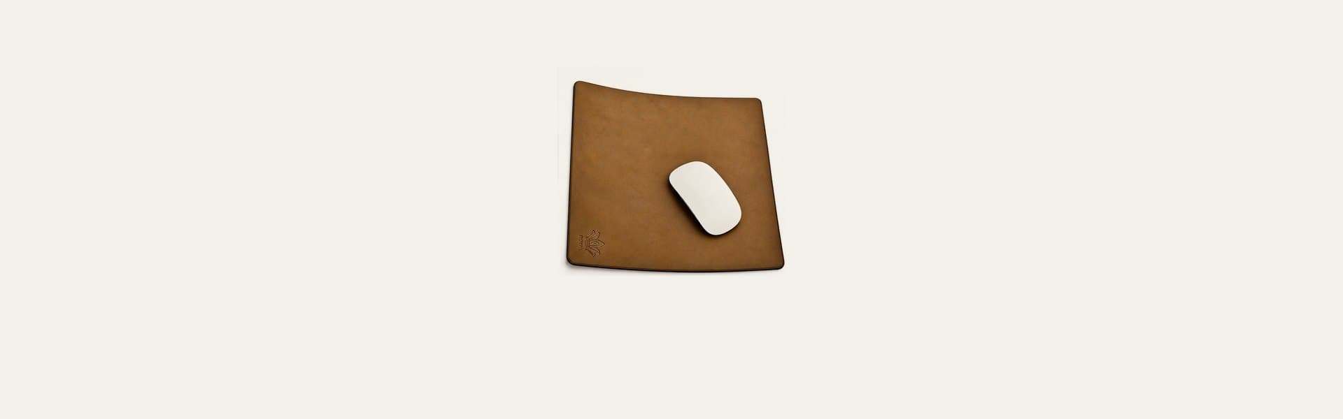 ROYAL leather desk accessories on a pale oat paper backdrop