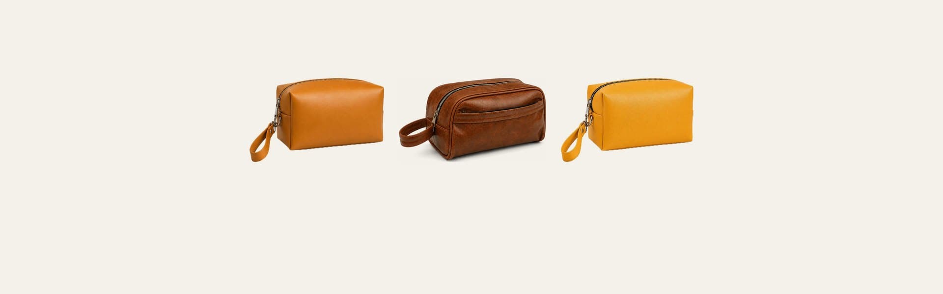 ROYAL leather toiletry bags on a pale sage backdrop