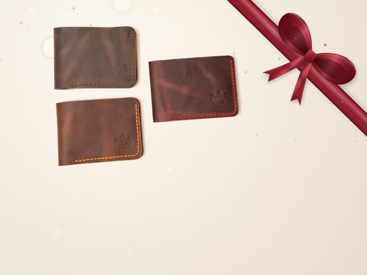 ROYAL full grain leather wallets on a warm oat linen backdrop
