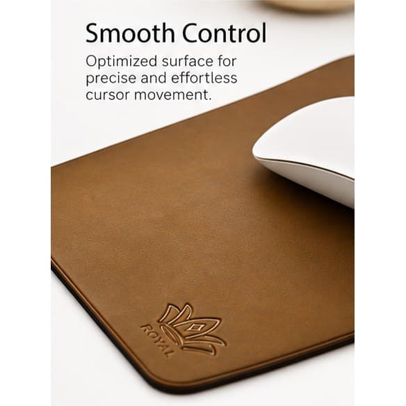 “Smooth Control”: close-up of a white mouse on the smooth dark brown leather surface of the ROYAL mouse pad