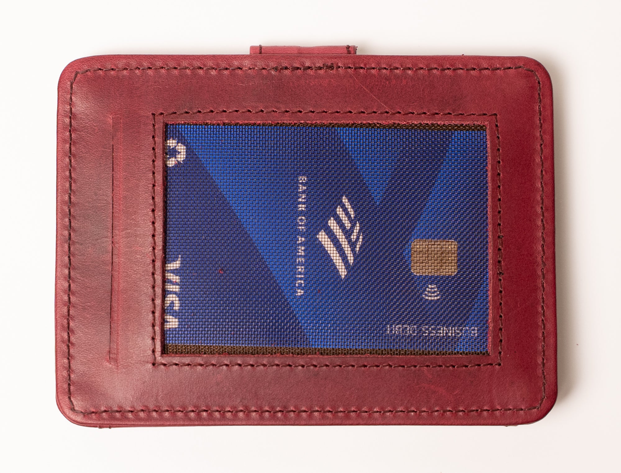 Red wallet with a blue card inside, featuring the Bank of America logo.